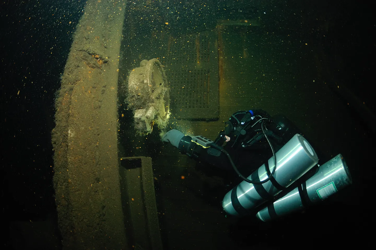 Technical diver documenting a wreck